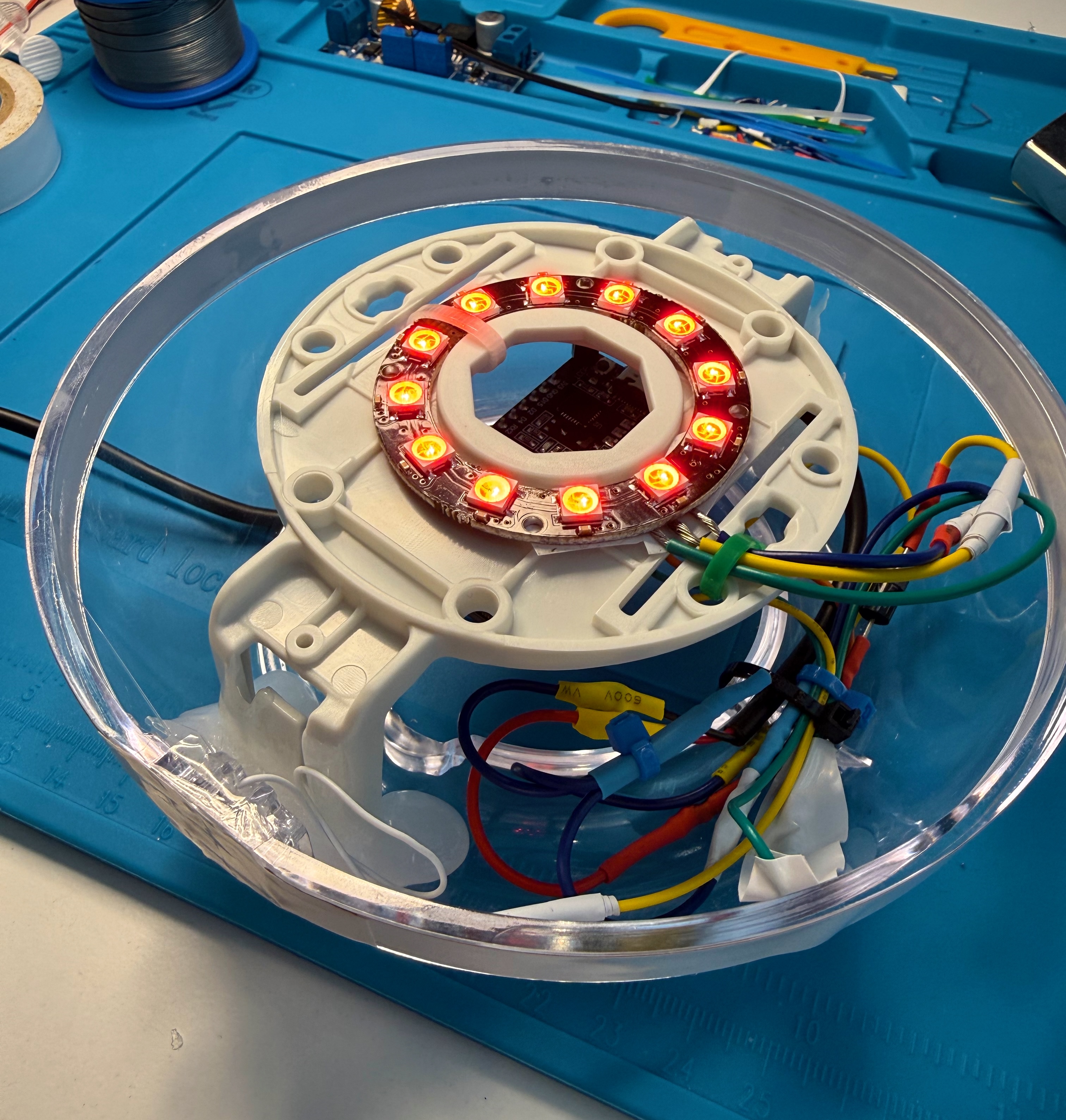 The WS2812 ring lit red on the base plate inside the lower egg half