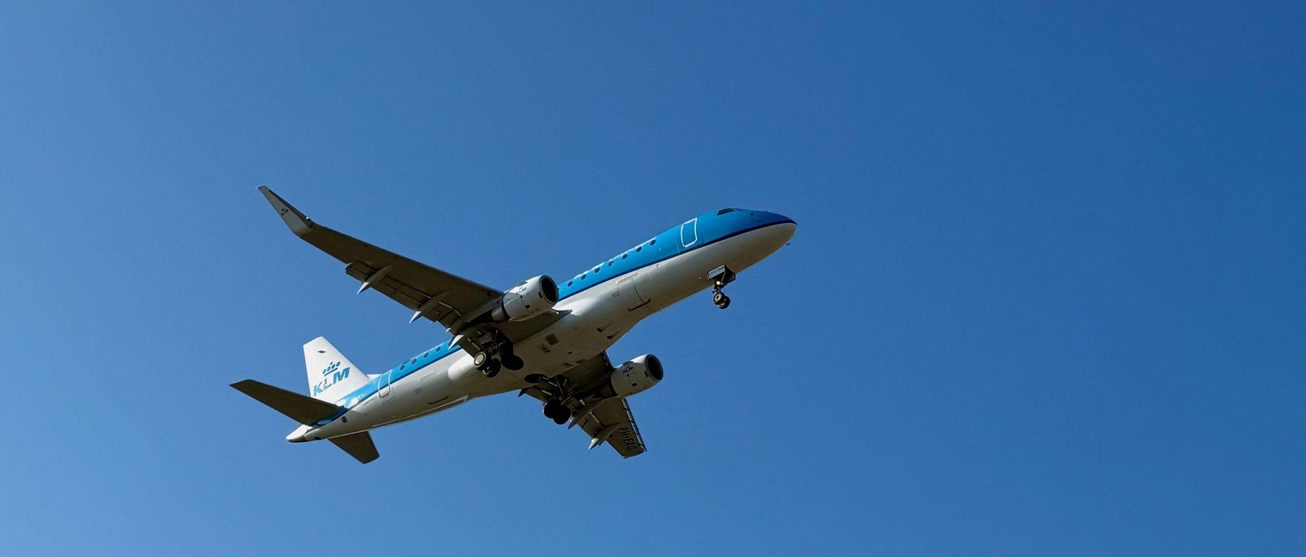Blue sky with a blue plane